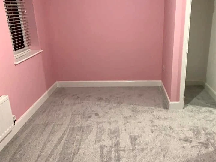 Silver carpet in a pink-walled bedroom, Newcastle