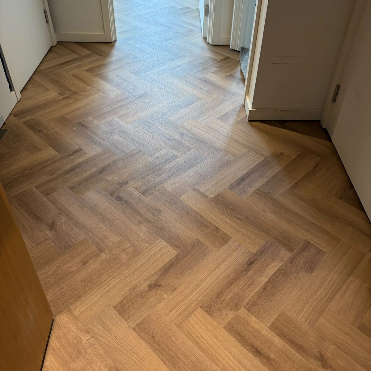 herringbone-vinyl-hallway-newcastle-foxglove-flooring Herringbone LVT through hallway and doorways, Newcastle