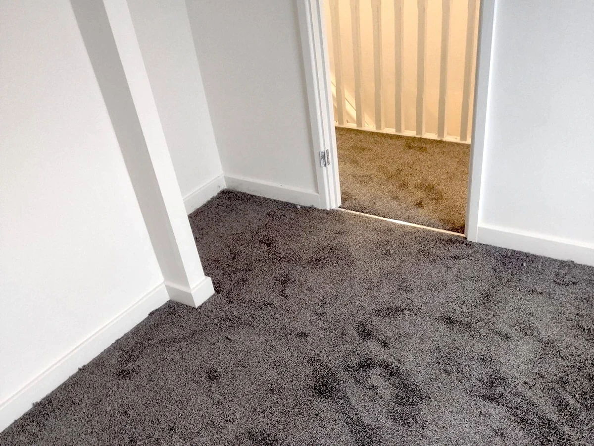 Dark grey carpet fitted through to the landing — carpet fitters covering Low Fell