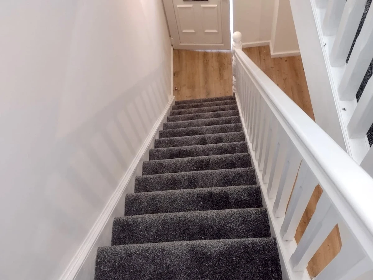 staircase-carpet-charcoal-white-balustrade-newcastle-foxglove-flooring Charcoal stair carpet with a white balustrade, Newcastle