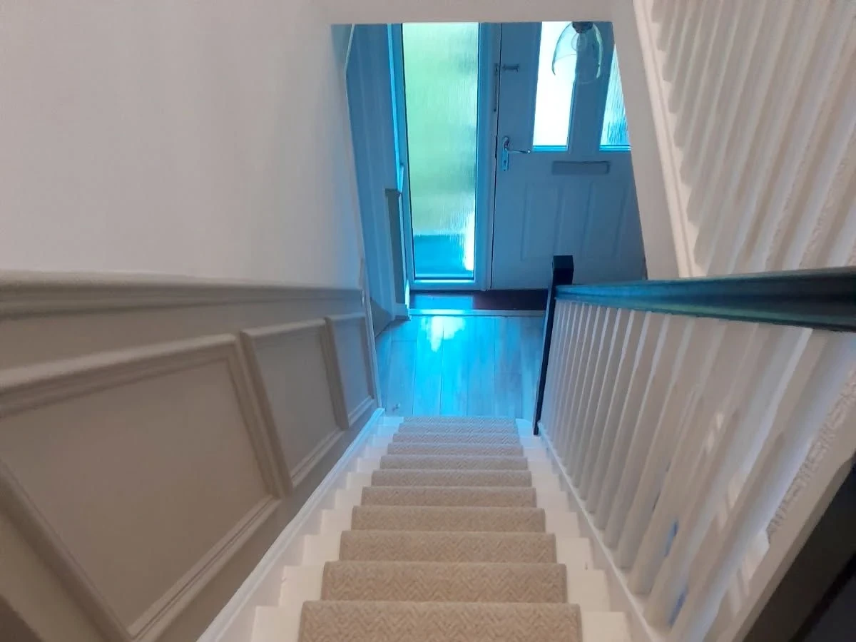staircase-carpet-herringbone-beige-stair-down-newcastle-foxglove-flooring Herringbone-weave stair carpet down to the front door — carpet fitters covering Dudley Annitsford
